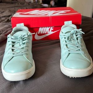 NIKE TANJUN. Size 6.5 Aurora Green. Inside soles are in good condition.